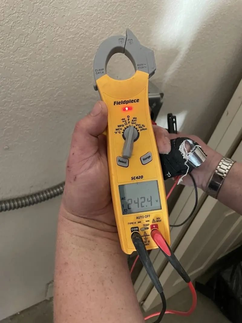 Voltage testing with clamp meter during Whole House Surge Protector in Rush